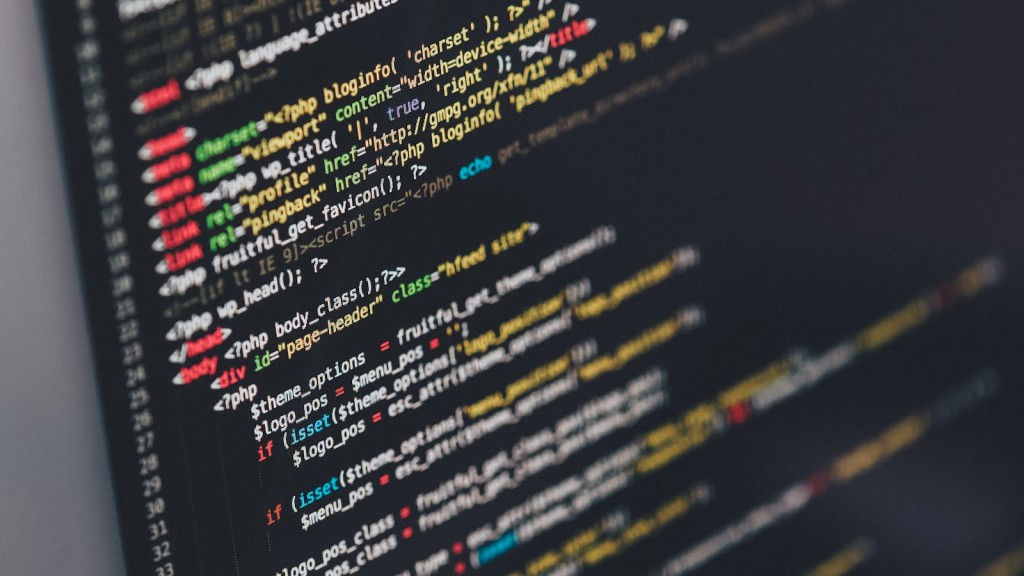 Developer's hands typing on a laptop showing a Python project's source code on screen