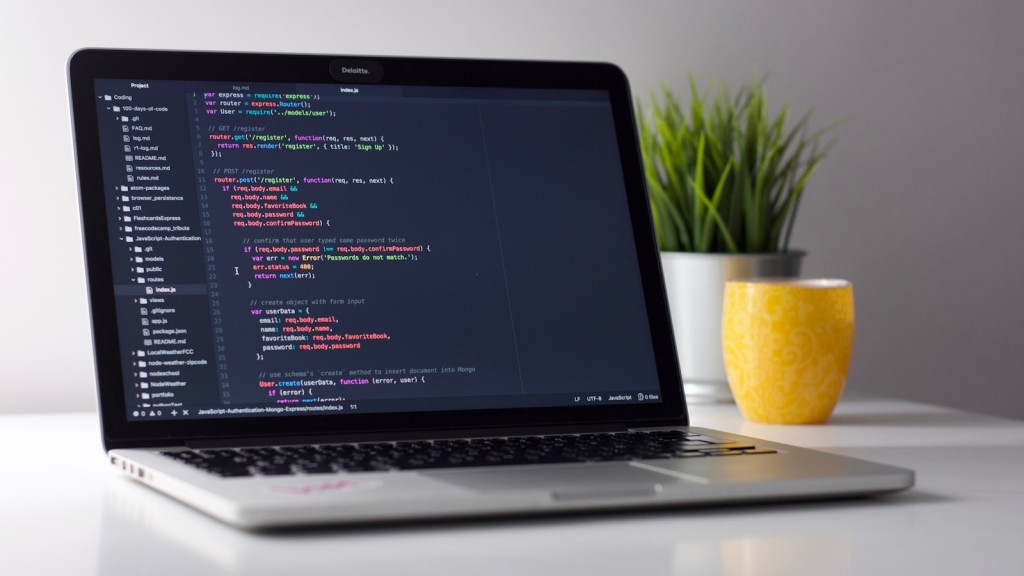 A developer's laptop screen showing Python code with conditional expressions, the everyday home of the ternary operator